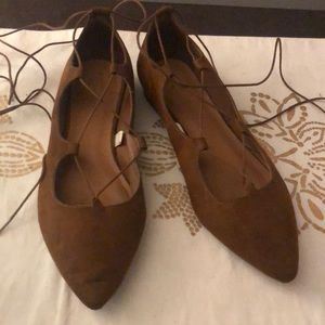 Brown tie up flats